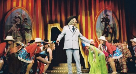 When he comes through the door i want you all to jump up and yell SURPRISE.