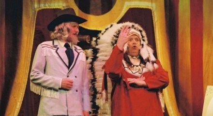 Sitting Bull offers Wild Bill Hickock heap big wampum for his snazzy jacket.